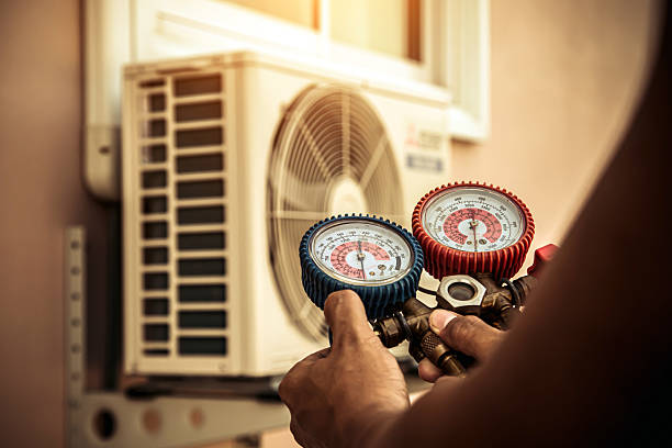 Professional Air Conditioning Service technician working in California, MD